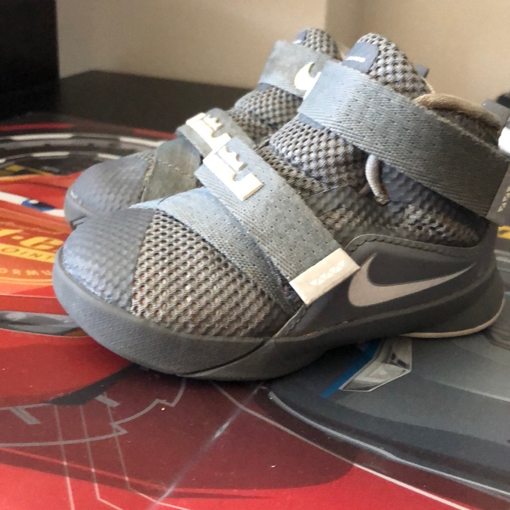 Gray and white high tops